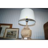 A nautical rope decorated table lamp