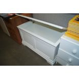 A modern white blanket box