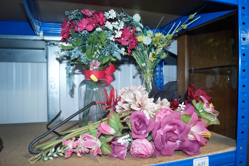 Two glass jars and collection of artificial flower