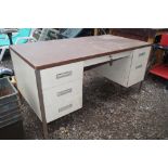 A desk fitted six drawers