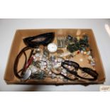 A tray containing various costume jewellery and su