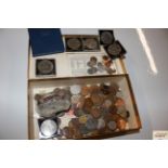 A box of mixed coinage and bank notes