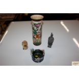 An Oriental cylindrical vase with flared top; and
