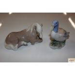 A Lladro ornament in the form of a horse AF; and