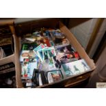 A box of various collector's cards to include Plan