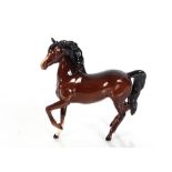 A Beswick figure of a trotting horse, Serial No.12
