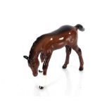 A Beswick model of a grazing foal Serial No.946 2