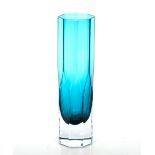 A large teal coloured glass vase by Swedish design