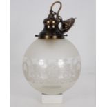 A glass globular hanging ceiling light with etched