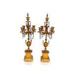 A pair of Victorian gilt metal five light candelab