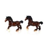 Two Doulton figures of cantering brown shire horse