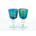 A pair of blue and green Mdina glass goblets raise