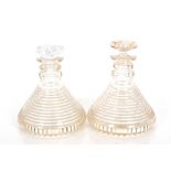 A pair of cut glass ships decanters with mushroom