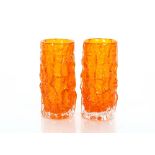 A pair of Whitefirars orange glass beaker vases, 1