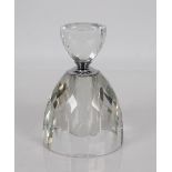 A large cylindrical cut crystal scent bottle