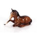 A Beswick model of a lying foal Serial No.915