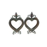 A pair of copper heart shaped lanterns