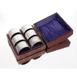 A cased set of six plated numbered napkin rings