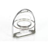 An Asprey plated stirrup cup, the glass in gimball