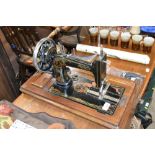 A Gritzner sewing machine (no case)