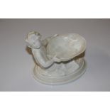 A Royal Worcester dish in the form of a mermaid ho