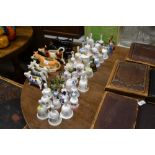 A quantity of various porcelain bells to include W