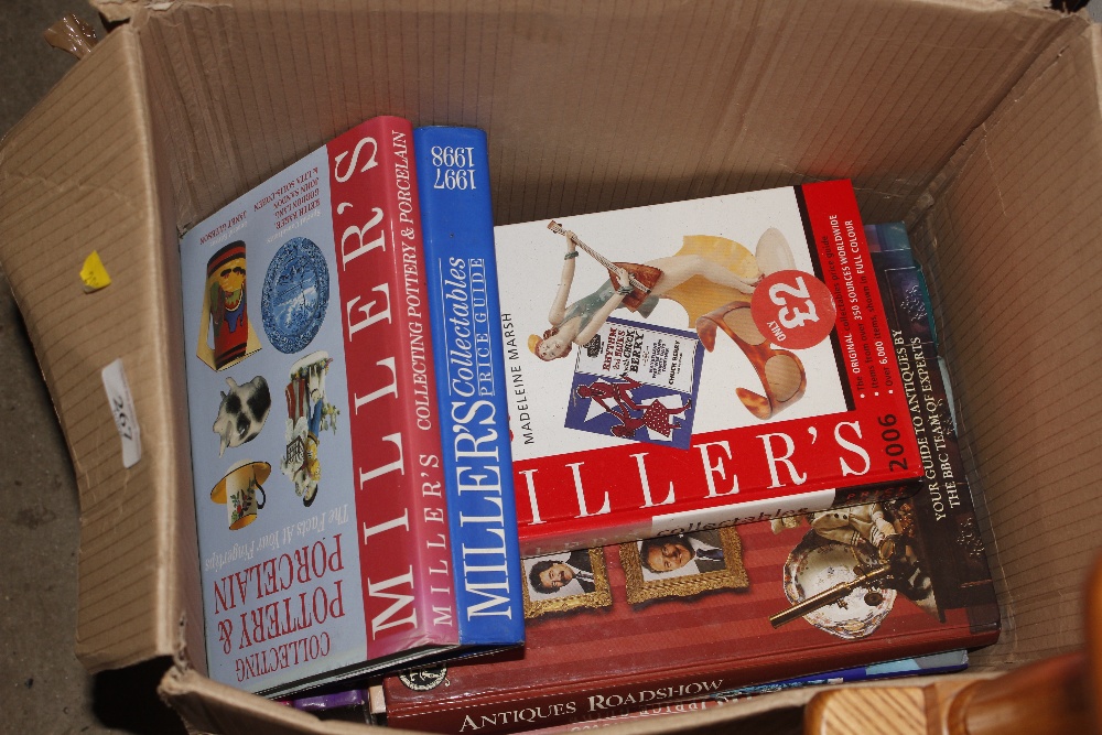 A box of Millers and other price guides