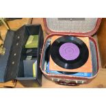 A small case and contents of 45rpm records etc.