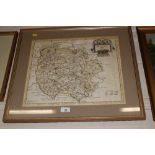 A framed and glazed hand coloured map of Herefords