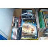 A box containing CDs and DVDs