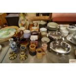 A collection of stainless steel dishes; various ju