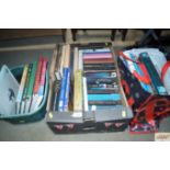 Two boxes and a bag of various books