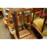 A mahogany and gilt framed wall mirror