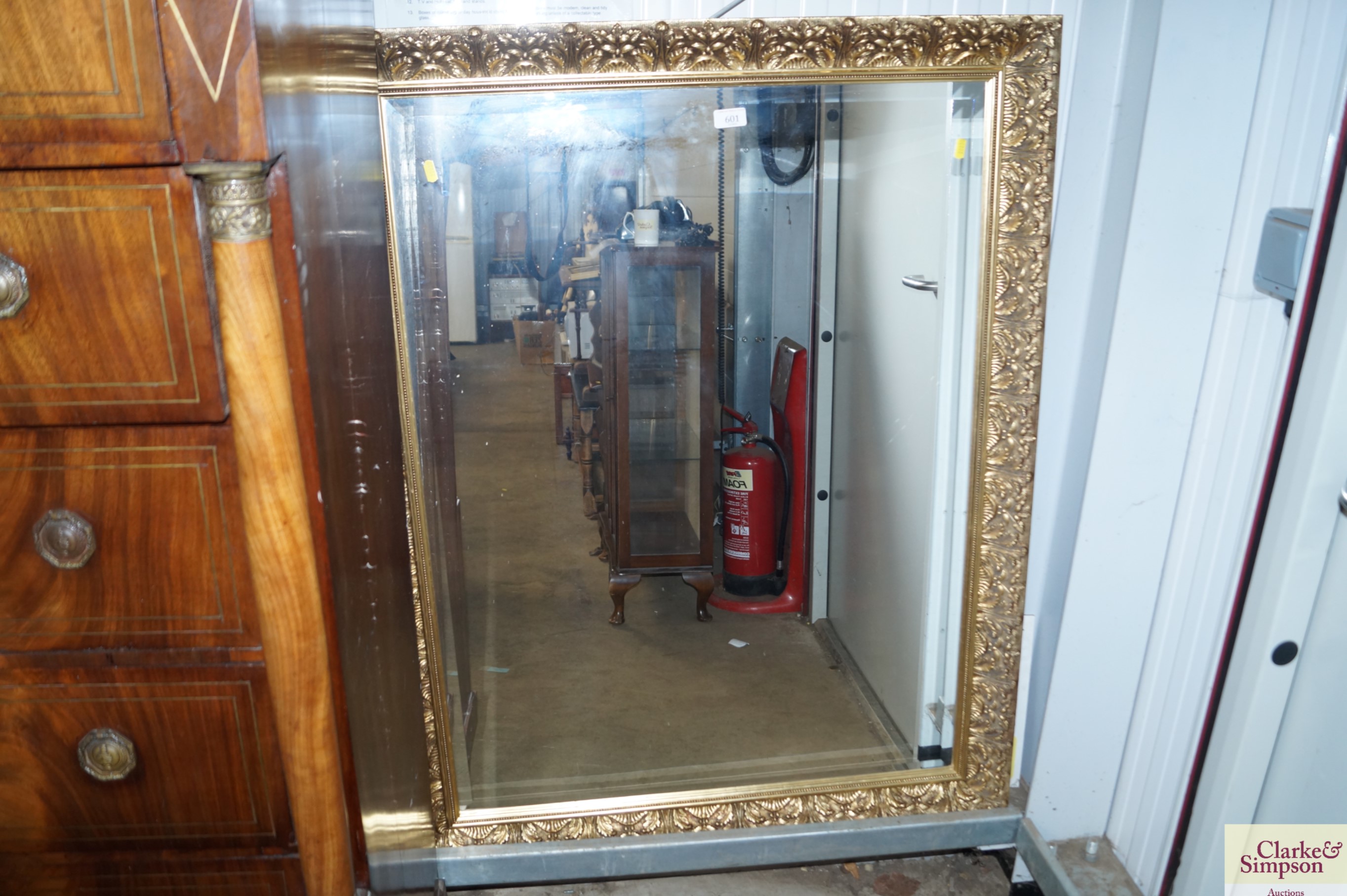 A gilt framed and bevel edge wall mirror