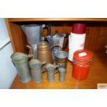 A Thermos flask, coffee pots, graduated set of mea