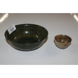 A small circular hardstone bowl; and a larger jade