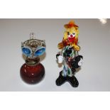 A Murano type glass clown ornament and a similar p