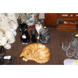 Four cat ornaments including a large Goebel exampl