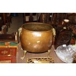 A 19th Century copper and brass planter with lion