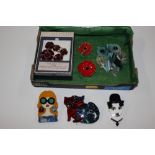 A tray of Art Deco brooches and poppy jewellery