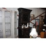 A 19th Century continental oak cabinet having colo