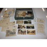 A box containing various indentures and post-cards