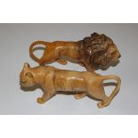 Two Beswick lion and lioness ornaments