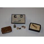 A pair of Oriental Niello ware cuff links and matc