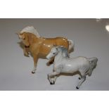 A Doulton Palomino horse; and a Doulton dappled ho