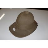 A Veso Everett Ltd pith helmet bearing military ma