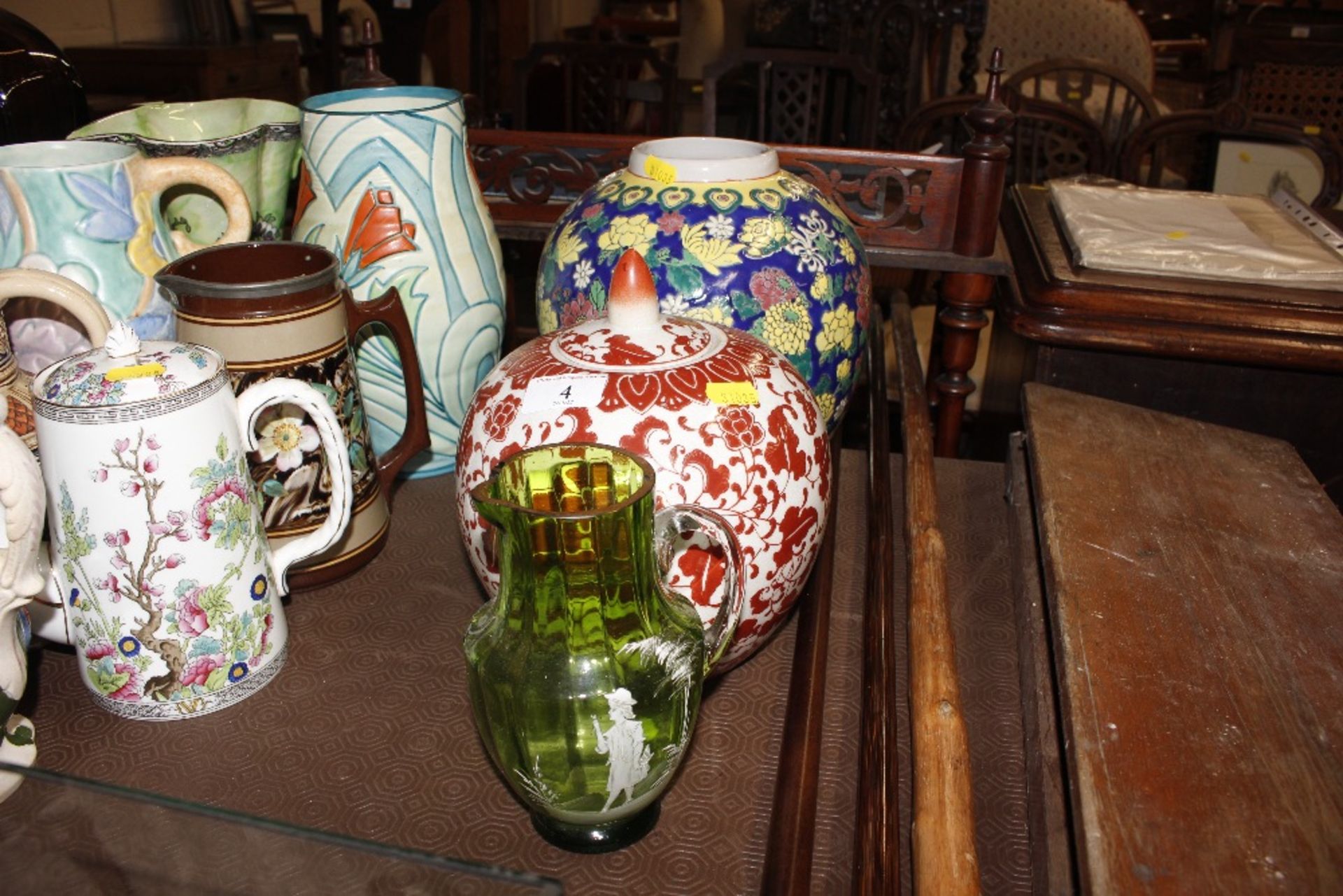 Two Oriental ginger jars, one lacking cover and a