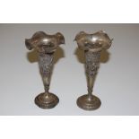 A pair of Indian white metal trumpet shaped vases