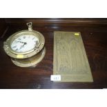 A battery operated brass cased ships style clock a