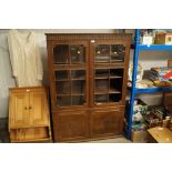 An oak and glazed bookcase AF